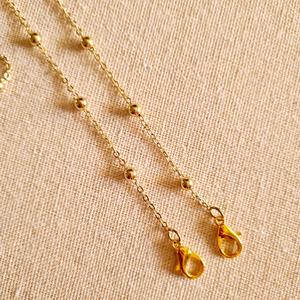 Collar Colgador Mascarillas Bolas Oro